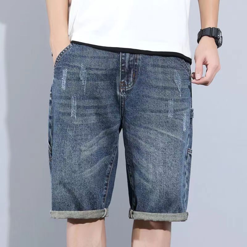 Pánske džínové šortky, potrhané detaily, stredná výška pása, rovný strih, zipsové zapínanie