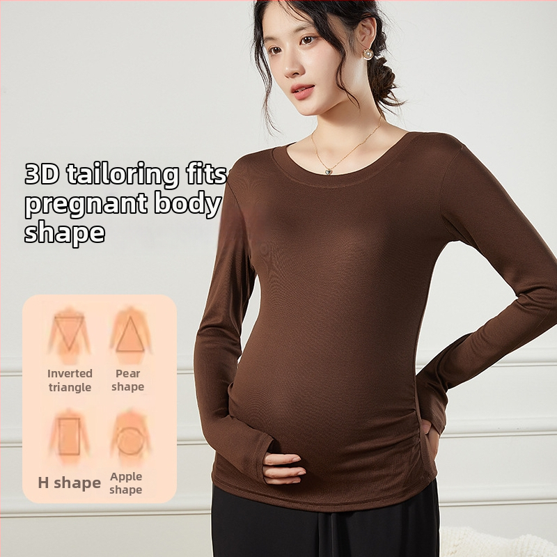 Grūtniecēm paredzēts pamata tops pavasarim un rudenim, viskoze (90–95%) ar līdz 30% spandexa, 3/4 garuma piedurknes, apaļš kakla izgriezums, vidēja garuma