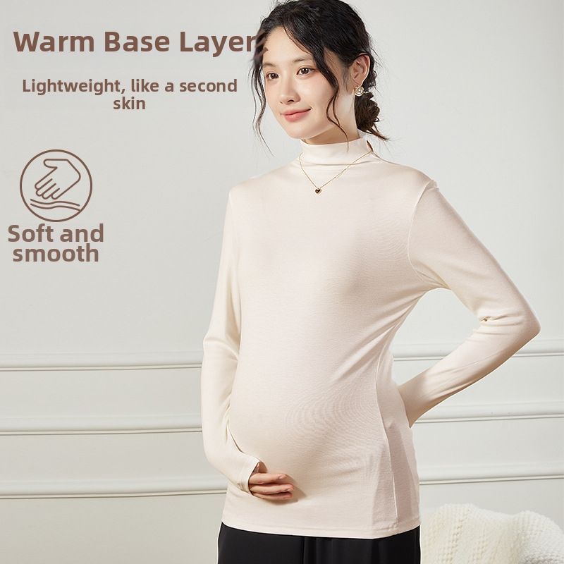 Grūtniecēm paredzēts pamata tops pavasarim un rudenim, viskoze (90–95%) ar līdz 30% spandexa, 3/4 garuma piedurknes, apaļš kakla izgriezums, vidēja garuma