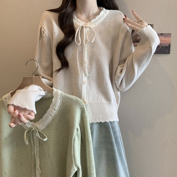 Cardigan-top s mašnicom – udoban kroj, dugi rukavi u stilu princeze, okrugli izrez, srednja duljina (50–65 cm), poliester 30–50%, zatvaranje gumbima, retro kineskog stila