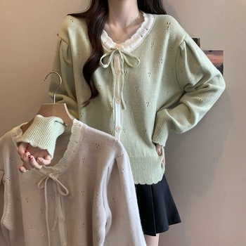 Cardigan-top s mašnicom – udoban kroj, dugi rukavi u stilu princeze, okrugli izrez, srednja duljina (50–65 cm), poliester 30–50%, zatvaranje gumbima, retro kineskog stila