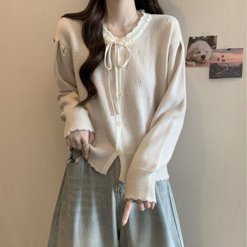 Cardigan-top s mašnicom – udoban kroj, dugi rukavi u stilu princeze, okrugli izrez, srednja duljina (50–65 cm), poliester 30–50%, zatvaranje gumbima, retro kineskog stila