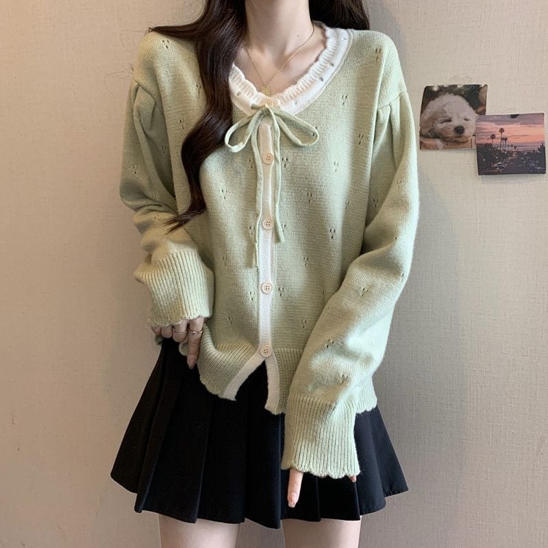 Cardigan-top s mašnicom – udoban kroj, dugi rukavi u stilu princeze, okrugli izrez, srednja duljina (50–65 cm), poliester 30–50%, zatvaranje gumbima, retro kineskog stila