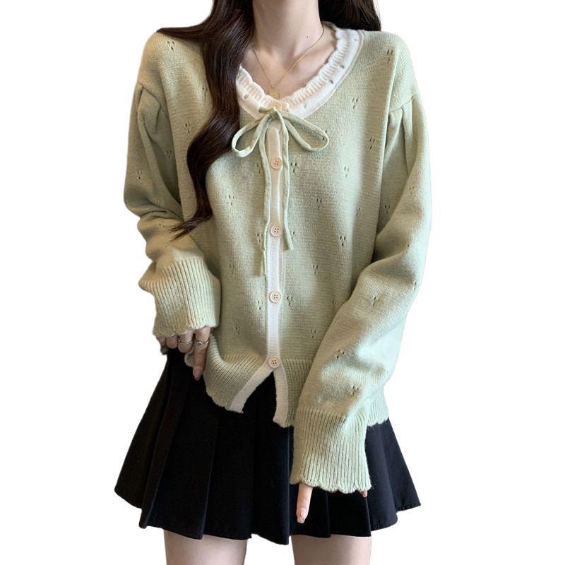 Cardigan-top s mašnicom – udoban kroj, dugi rukavi u stilu princeze, okrugli izrez, srednja duljina (50–65 cm), poliester 30–50%, zatvaranje gumbima, retro kineskog stila