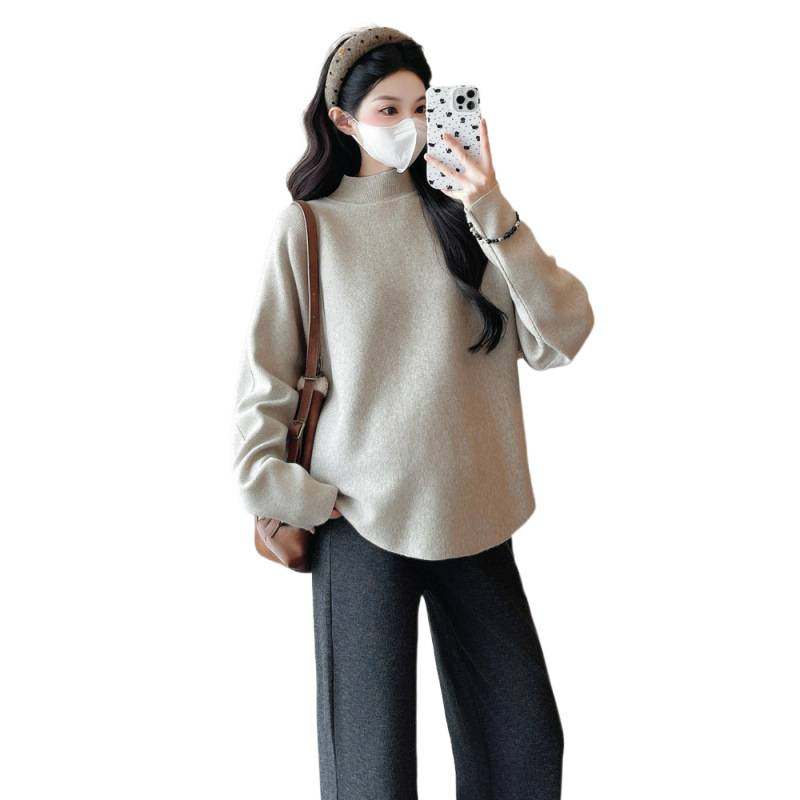 Trudnički pleteni top s kapuljom, slobodan kroj, bat rukavi, srednja duljina, jednobojna, viskozni vlakno 30–50%, jesen 2025