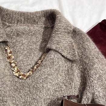 Vlnený sveter s V- výstrihom, dlhé rukávy, voľný strih, dĺžka 50–65 cm, stredná hrúbka