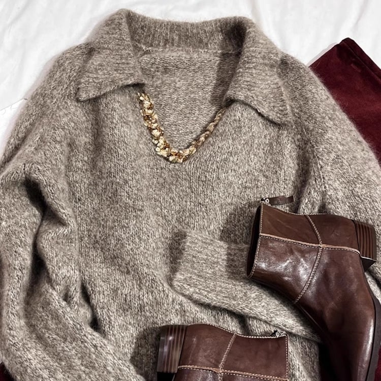 Vlnený sveter s V- výstrihom, dlhé rukávy, voľný strih, dĺžka 50–65 cm, stredná hrúbka