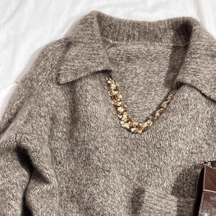 Vlnený sveter s V- výstrihom, dlhé rukávy, voľný strih, dĺžka 50–65 cm, stredná hrúbka