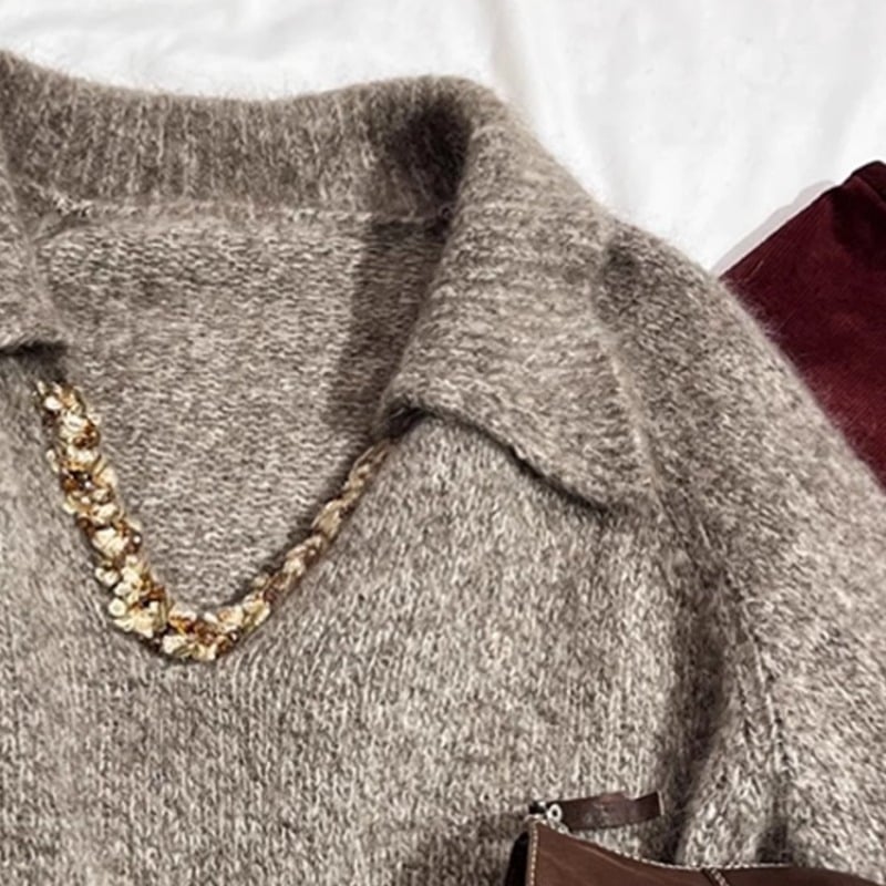 Vlnený sveter s V- výstrihom, dlhé rukávy, voľný strih, dĺžka 50–65 cm, stredná hrúbka