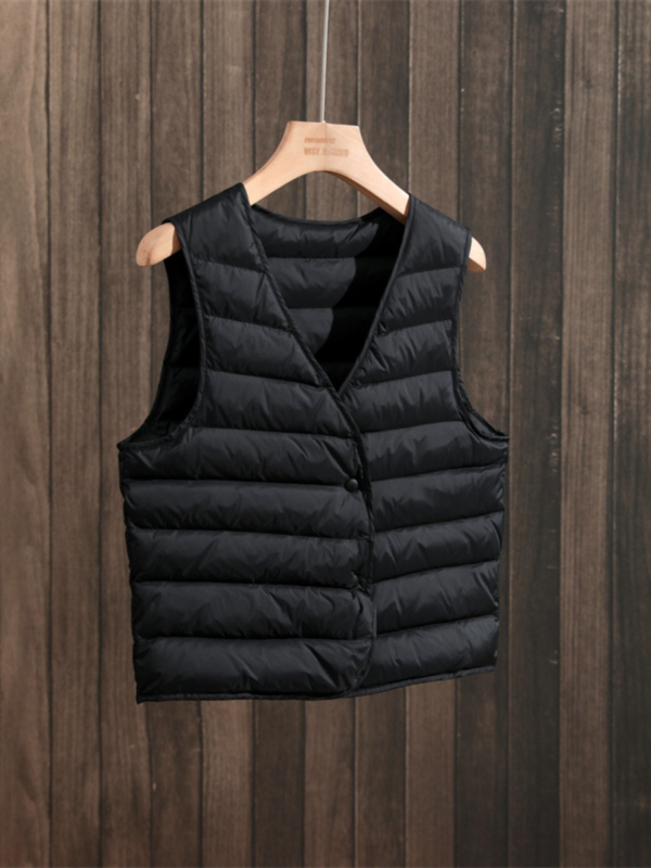 Ženski prsluk od perja s V-izrezom, bijeli gusji down 86–90%, velika veličina, srednja debljina, jednostruko kopčanje, duljina 50–65 cm