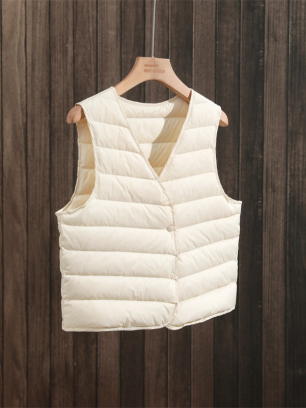 Ženski prsluk od perja s V-izrezom, bijeli gusji down 86–90%, velika veličina, srednja debljina, jednostruko kopčanje, duljina 50–65 cm