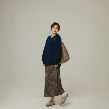 Suknja A-line s leopard uzorkom, midi duljine, materijal poliester sa spandeksom, mikroelastičnost, jesen 2025