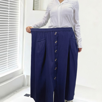 A-linijska suknja, visoki pojas, srednja duljina, pamuk-elastični denim, naborita tekstura