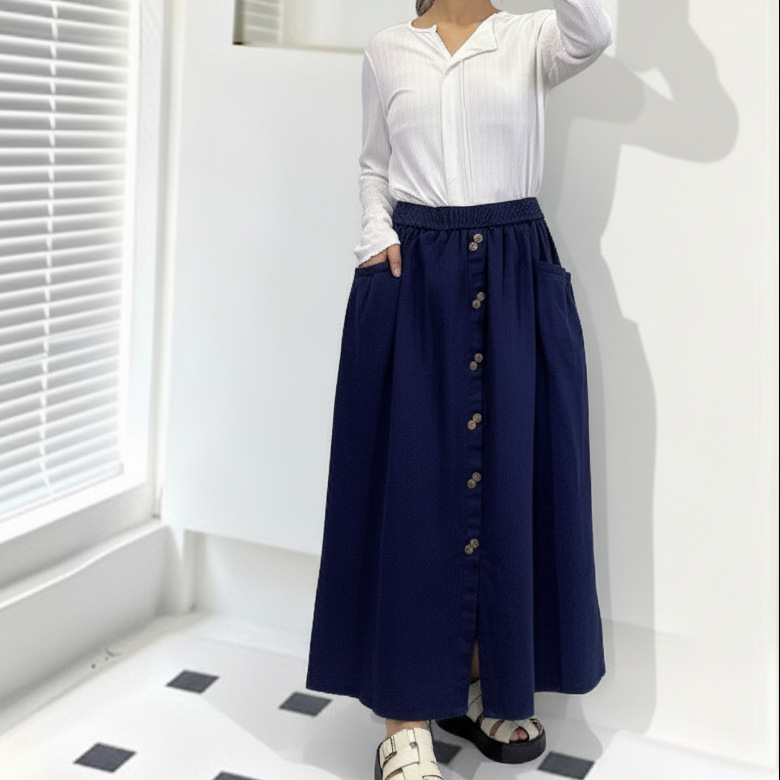 A-linijska suknja, visoki pojas, srednja duljina, pamuk-elastični denim, naborita tekstura