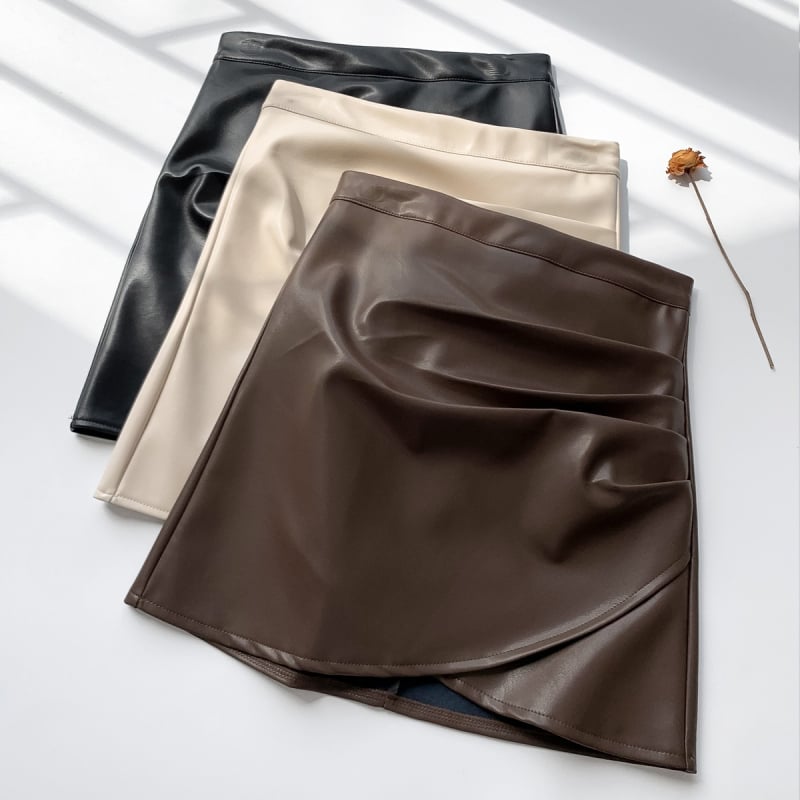 PU kožna mini suknja — jednobojna, mikroelastičnost, elegantan gradski stil