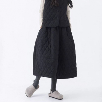 Pamučna Bud suknja, jednofarbna, srednje duljine, šavovi splicing, jesen-zima kolekcija 2025, elegantan gradski stil