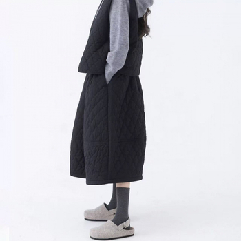 Pamučna Bud suknja, jednofarbna, srednje duljine, šavovi splicing, jesen-zima kolekcija 2025, elegantan gradski stil