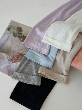 Lyocell anyagú kardigán laza szabásban, hosszú ujjú, vékony kötött anyag, hossza 50–65 cm, Lyocell 30–50% és akril 30–50%