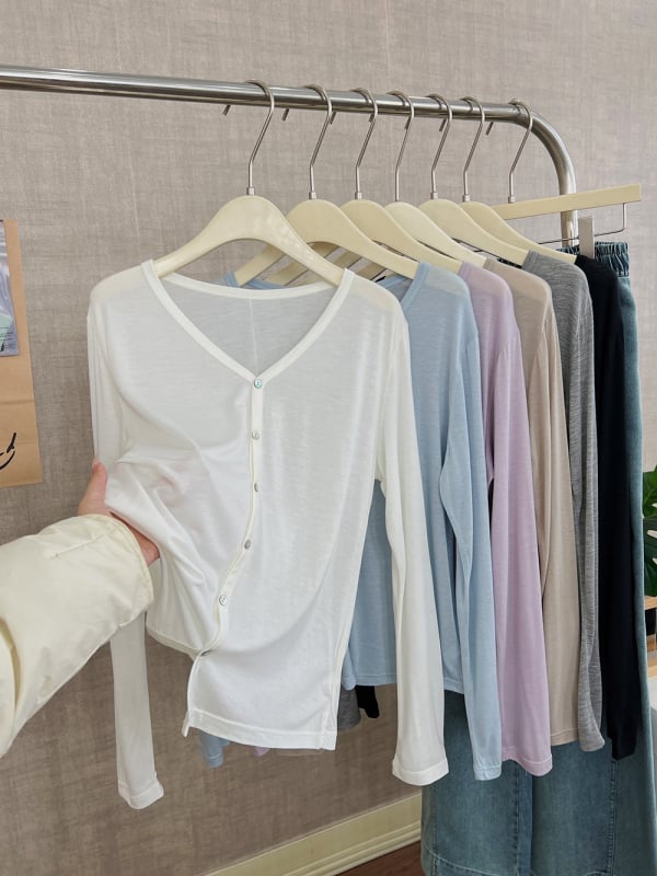 Lyocell anyagú kardigán laza szabásban, hosszú ujjú, vékony kötött anyag, hossza 50–65 cm, Lyocell 30–50% és akril 30–50%