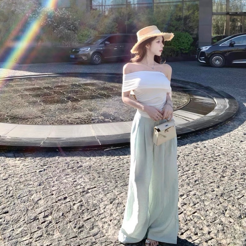 Asümmeetrilise paelaga T-särk, bez mangas, kolaaži disain, polüesterkangas, pikkus 50–65 cm