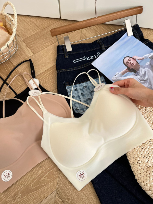 Nailonist rinnahoidja top seljal ristuvate rihmadega, vestilaadne stiil, täis tass, õhukesed vormitud tassid