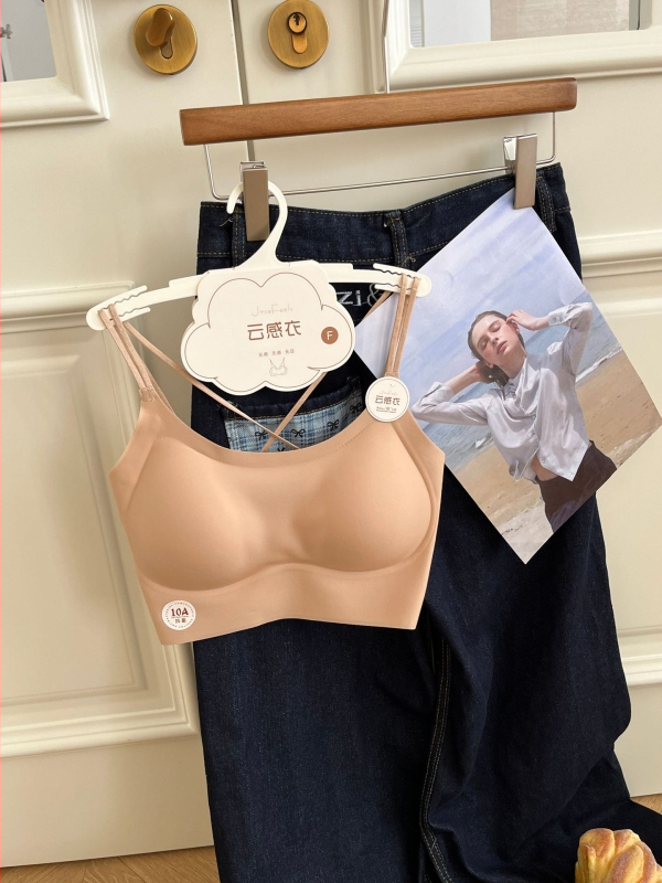 Nailonist rinnahoidja top seljal ristuvate rihmadega, vestilaadne stiil, täis tass, õhukesed vormitud tassid