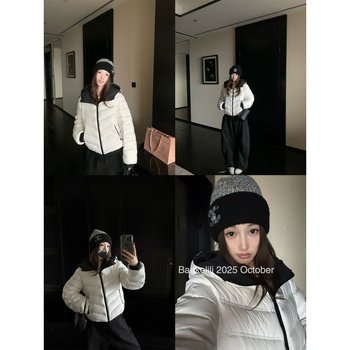 Dámska bunda s kapucňou z kačacieho páperia – obsah páperia 51–55%, hrubá izolácia, zips, dĺžka 50–65 cm.