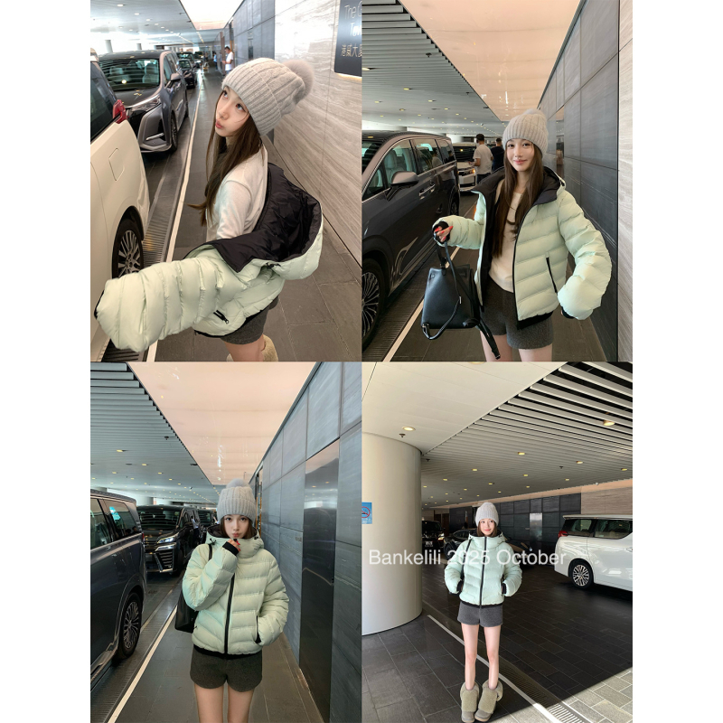 Dámska bunda s kapucňou z kačacieho páperia – obsah páperia 51–55%, hrubá izolácia, zips, dĺžka 50–65 cm.