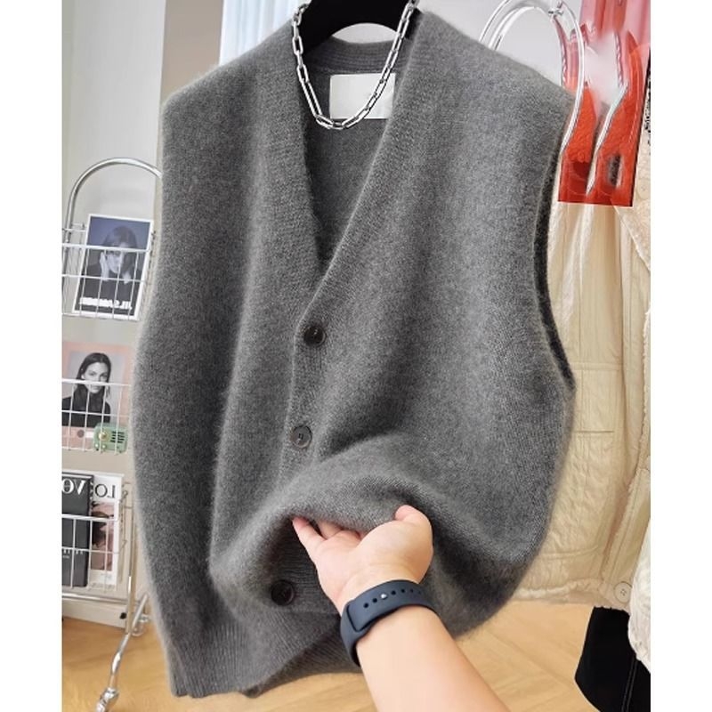 Ženski bezrukavni kardigan-vest s V izrezom, slobodan kroj, srednja duljina 50–65 cm, viskoza 70–80%, Proljeće 2025