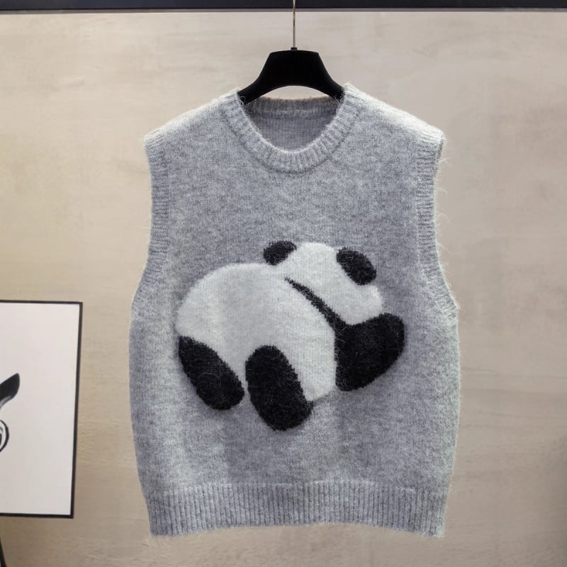 Prošireni pulover s Panda jacquardom i pliš teksturom, slobodan kroj, duljina 50–65 cm, materijal poliester i elastan, punjenje poliester-pamuk
