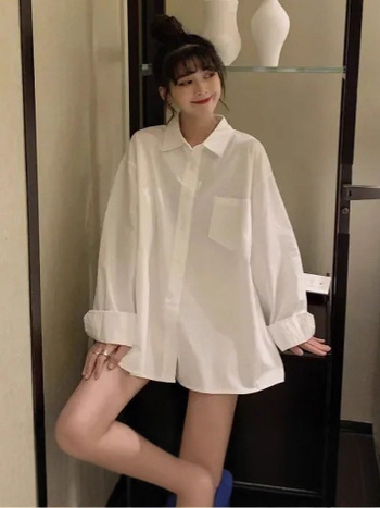 Polüesterist särk polo krae, pikkade varrukatega, vabast lõikega