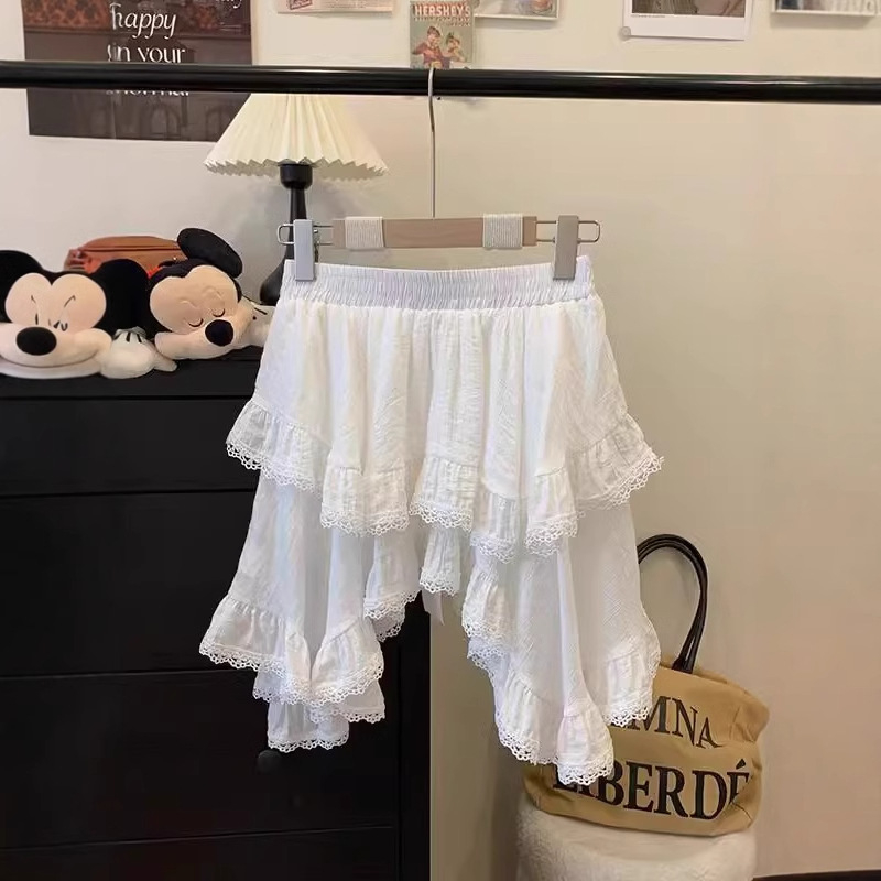 Nepravilna kratka suknja od poliestera, jednobojna, s volanima i asimetričnim dizajnom, udio poliestera 30–50%, proljeće 2025