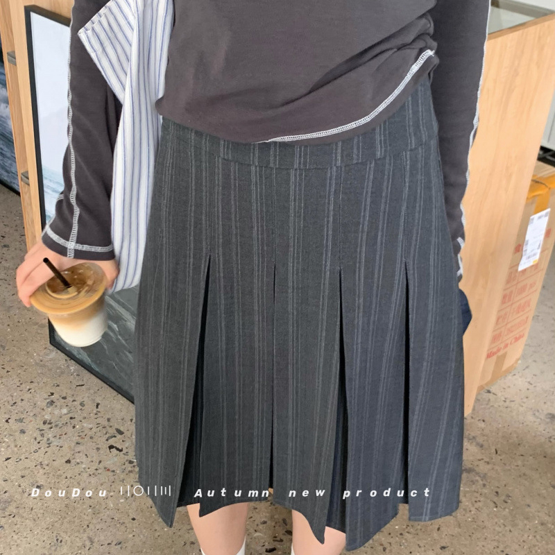 Suknja sa zipom, srednje duljine, mikroelastičnost, jesen 2025, gradski stil