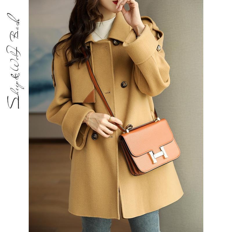 Ženski vuneni kaput s reverom i dugim rukavima – gradski stil za jesen 2023 (Materijal: vunena tkanina; Sastav materijala: 70–80% poliestera; Ovratnik: rever; Duljina rukava: duga; Spol: žena; Sezona: jesen 2023)