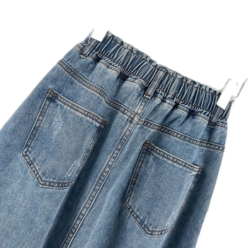 Traper suknja srednje duljine s A-linijom i kišobran siluetom, elastičan visok pojas, gumbe, 50–70% elastan