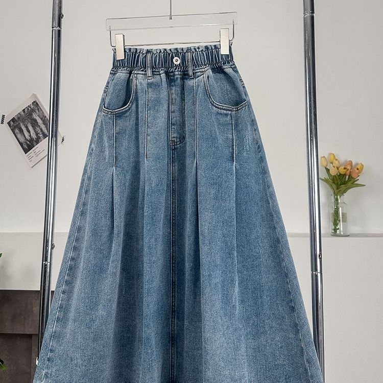 Traper suknja srednje duljine s A-linijom i kišobran siluetom, elastičan visok pojas, gumbe, 50–70% elastan