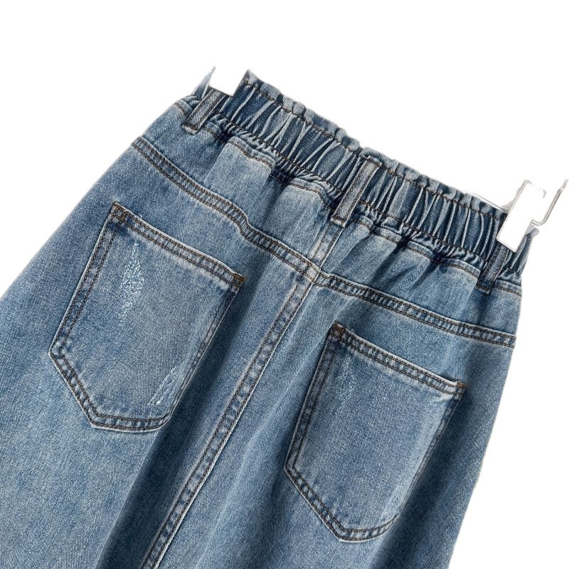 Traper suknja srednje duljine s A-linijom i kišobran siluetom, elastičan visok pojas, gumbe, 50–70% elastan