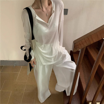 Nylon bluza s dugim rukavima, slobodan kroj, tanko tkivo, sadržaj najlona 90–95%