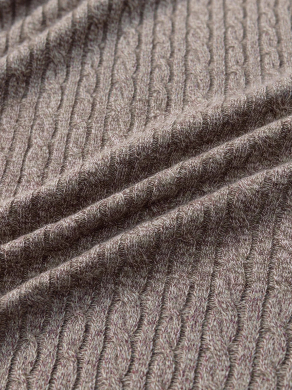 Πλεκτός πουλόβερ με φλοράλ καμπά πλέξη από μαλλί, μισό φερμουάρ, χαλαρή εφαρμογή.