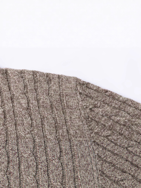 Πλεκτός πουλόβερ με φλοράλ καμπά πλέξη από μαλλί, μισό φερμουάρ, χαλαρή εφαρμογή.