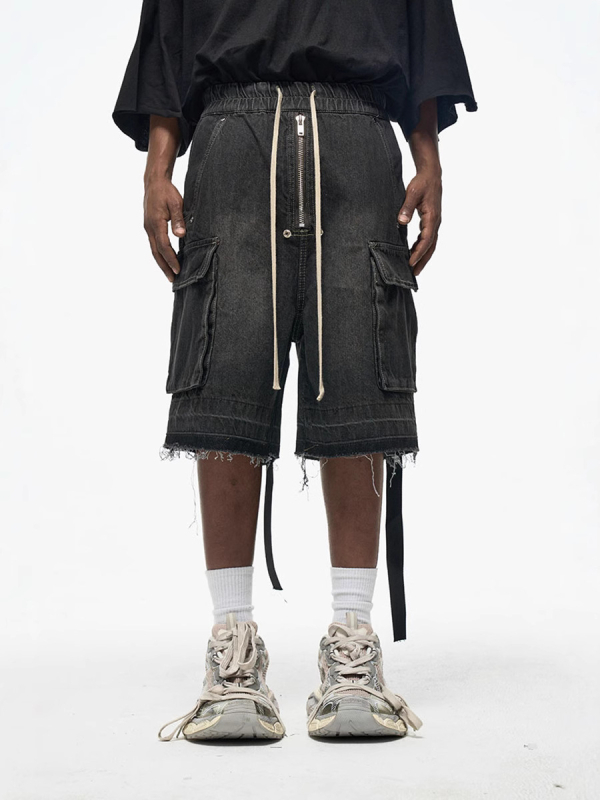 Traper kratke hlače s patentnim zatvaračem, opuštenog ravnog kroja, srednji pojas, bočne džepove, oprane i s poderanim rubovima