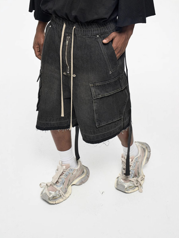 Traper kratke hlače s patentnim zatvaračem, opuštenog ravnog kroja, srednji pojas, bočne džepove, oprane i s poderanim rubovima