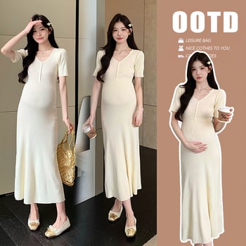 Rochie tricotată pentru gravide, decolteu în V, mâneci 3/4, bumbac 50–70% cu elastan <30%, croială A-line lungă, vară 2025