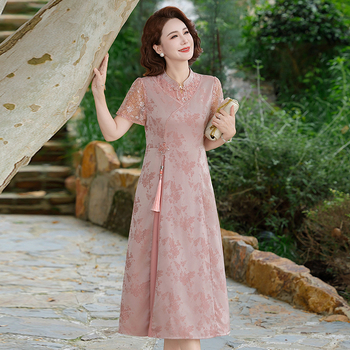 Suknelė kinų stiliaus – medvilnės ir lino audinys; poliesterio iki 30%; ilgis 100 cm