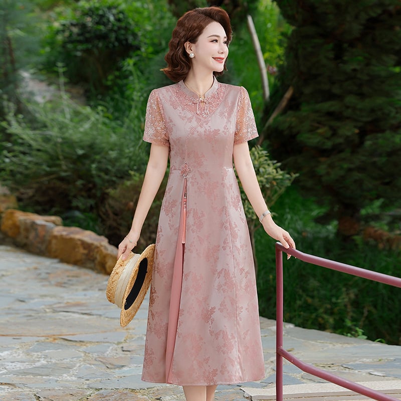 Suknelė kinų stiliaus – medvilnės ir lino audinys; poliesterio iki 30%; ilgis 100 cm