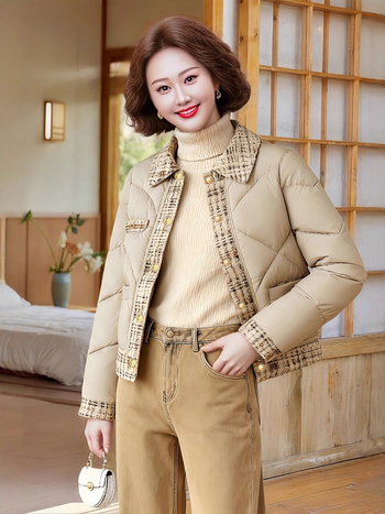 Ženski kaput s punjenjem od pamuka i poliestera, srednja duljina, rever, dugi rukavi, slobodni kroj