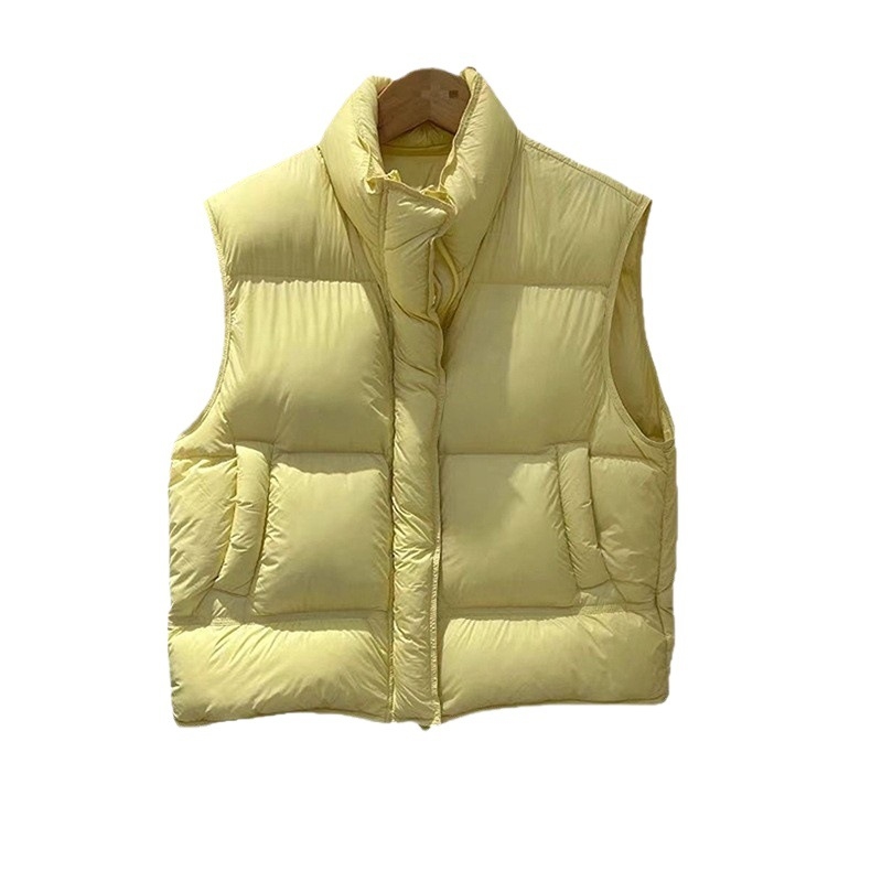 Ženski najlonski pufasti prsluk s stojećim ovratnikom i zatvaračem, kratkog kroja, 86–90% perja