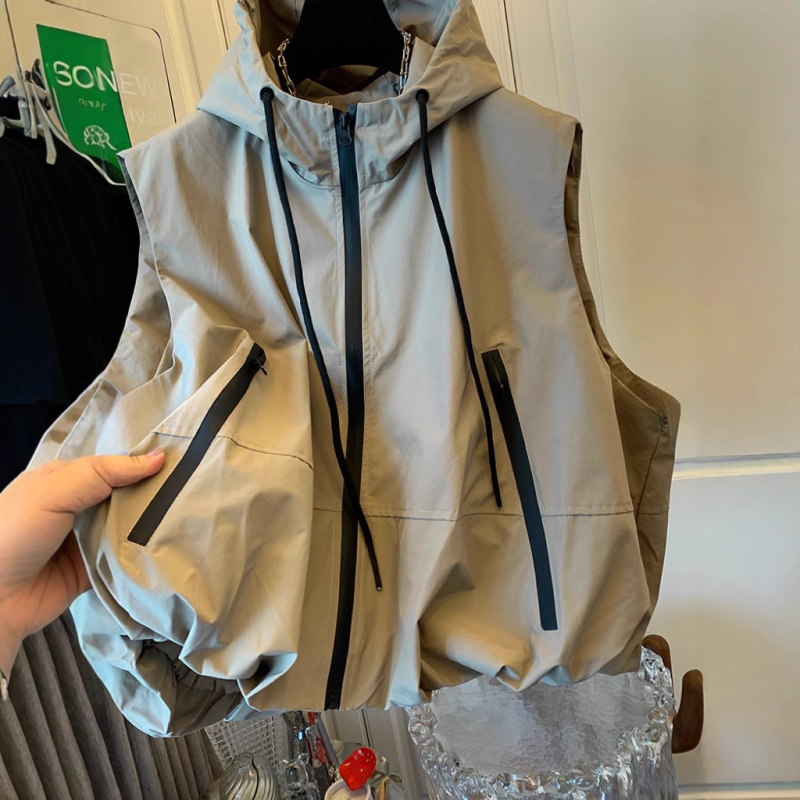 Ženski bezrukavni vest s stojećim ovratnikom, kratka duljina 40–50 cm, poliester, prednji zatvarač