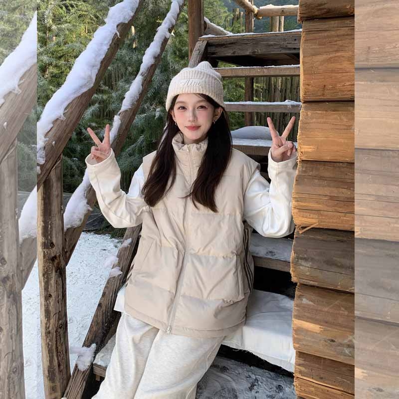 Ženska bezruk zimsku jaknu sa stojećim ovratnikom, slobodan kroj, zatvarač, punilo poliester i pamuka