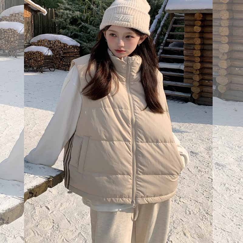 Ženska bezruk zimsku jaknu sa stojećim ovratnikom, slobodan kroj, zatvarač, punilo poliester i pamuka